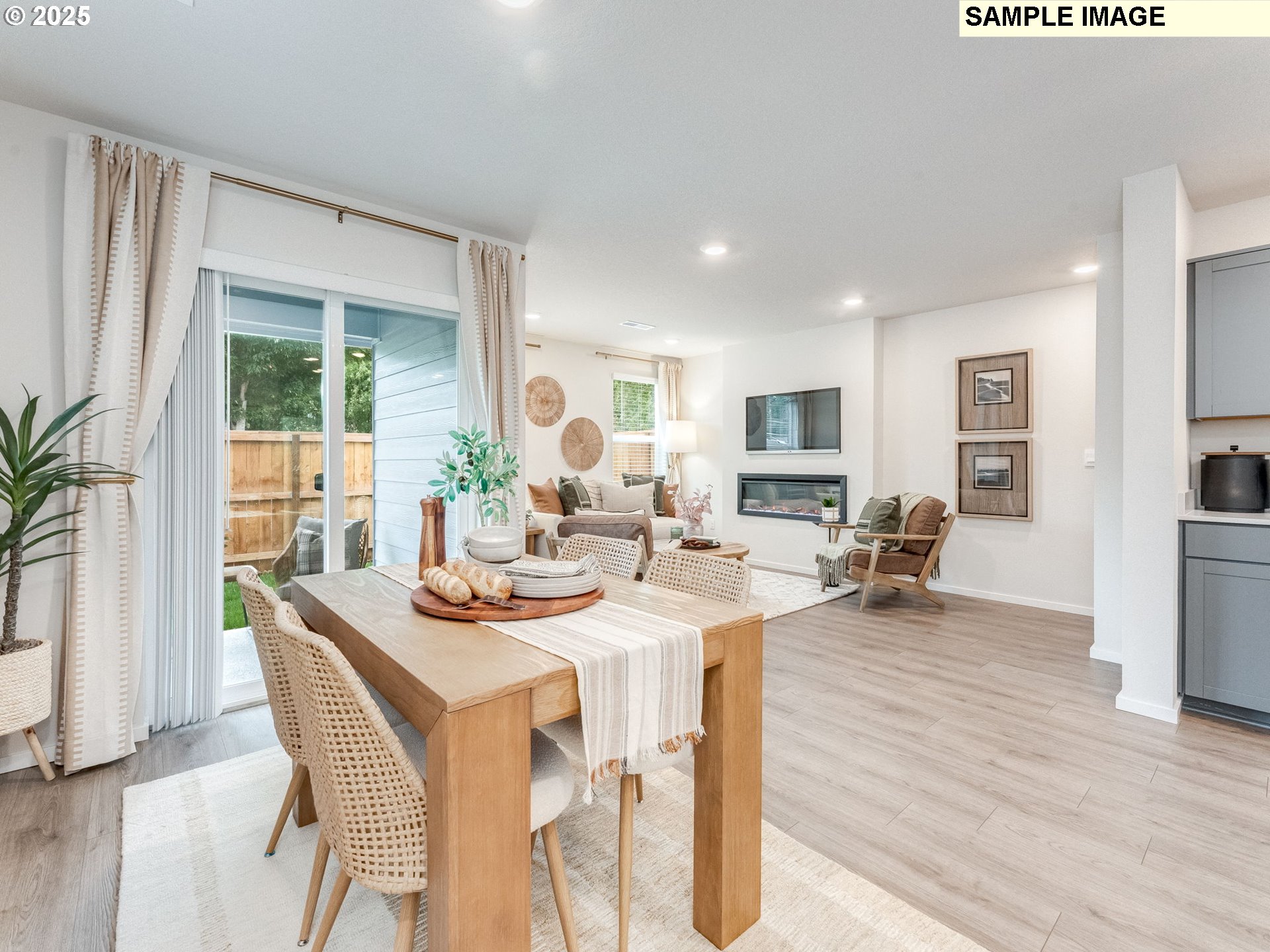 1105 Southeast 194th Place Camas, WA 98607 - Photo 8 of 26 a dining room with furniture window and wooden floor