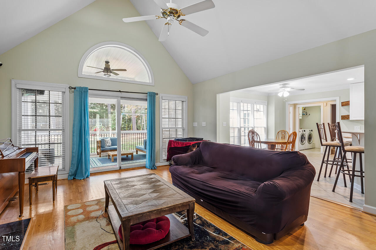 7917 Fairlake Drive Wake Forest, NC 27587 - Photo 12 of 34 a living room with furniture a couch and wooden floor