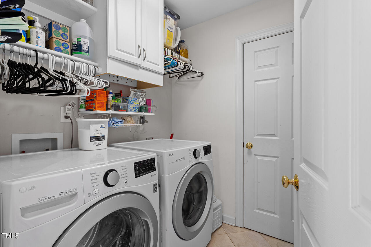 7917 Fairlake Drive Wake Forest, NC 27587 - Photo 21 of 34 a utility room with dryer and washer