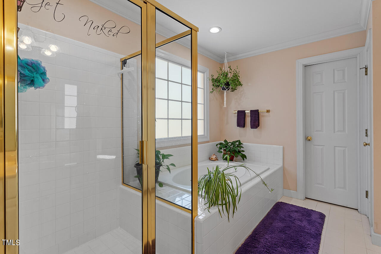 7917 Fairlake Drive Wake Forest, NC 27587 - Photo 26 of 34 a view of entryway and livingroom with furniture