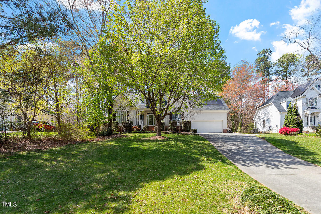 7917 Fairlake Drive Wake Forest, NC 27587 - Photo 3 of 34 a view of a house with a yard