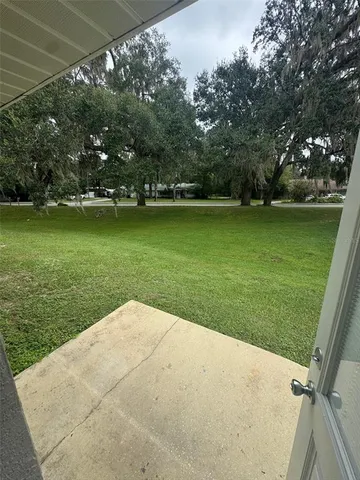 a view of a golf course with a lake
