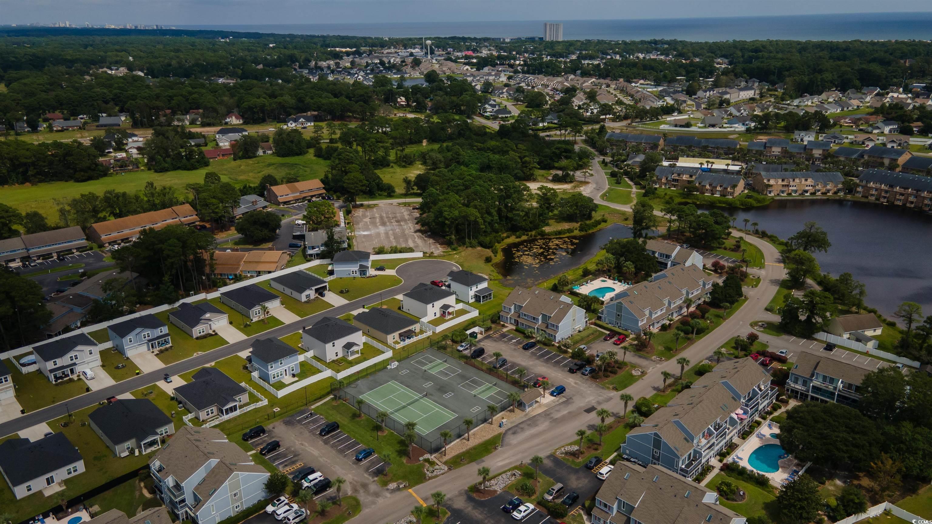 1850 Colony Drive, Unit 3D Surfside Beach, SC 29575 - Photo 29 of 38 Aerial view of property's location featuring nearby suburban area and a large body of water