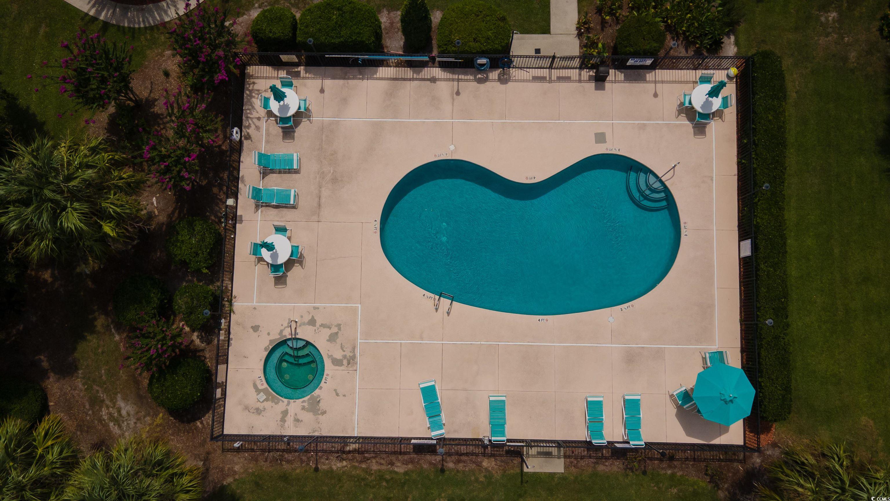 1850 Colony Drive, Unit 3D Surfside Beach, SC 29575 - Photo 33 of 38 Aerial view of a pool area