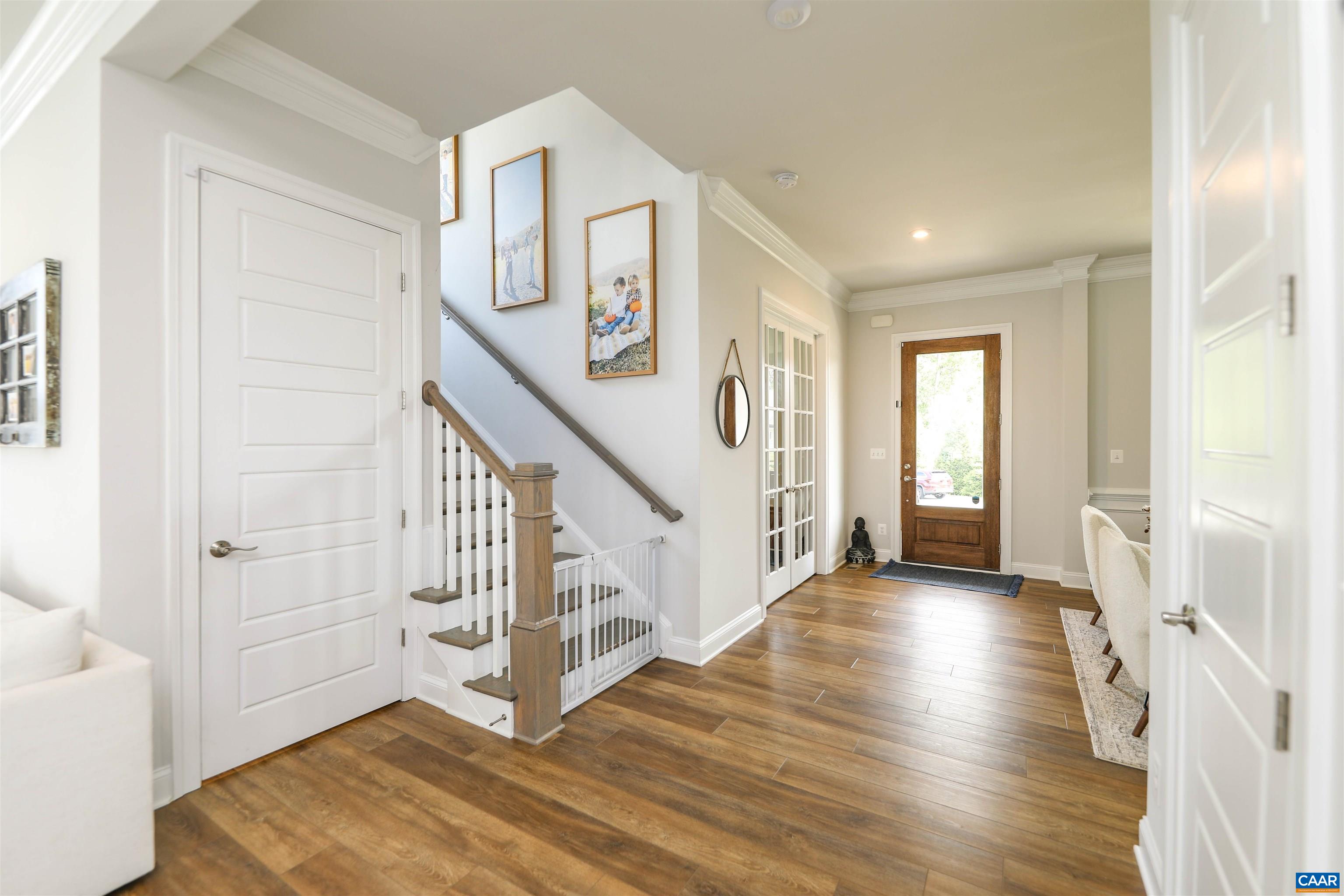 2483 Ferndown Lane Keswick, VA 22947 - Photo 5 of 54 a view of an entryway with wooden floor