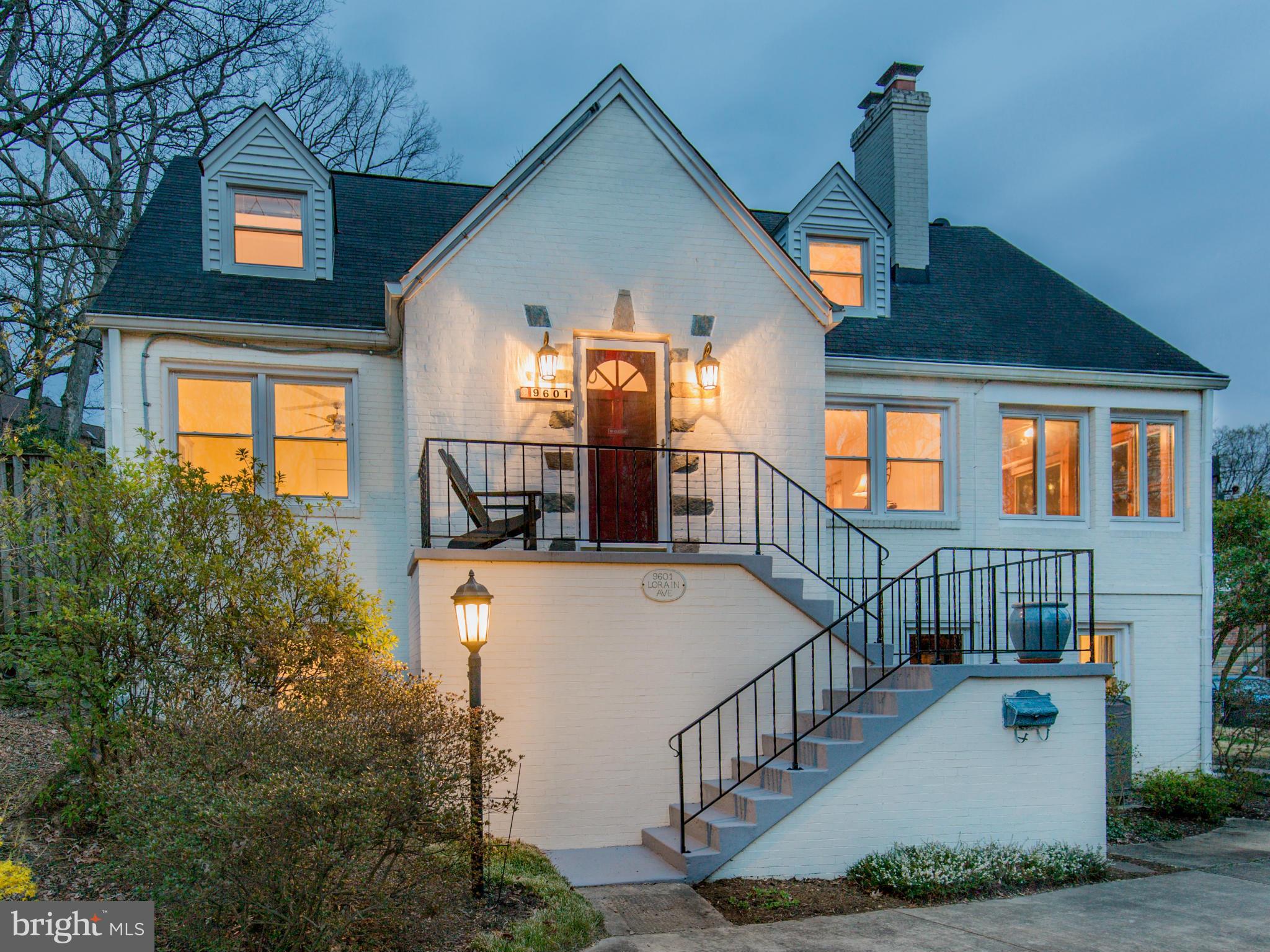 9601 Lorain Avenue Silver Spring, MD 20901 - Photo 1 of 30 a front view of a house with balcony