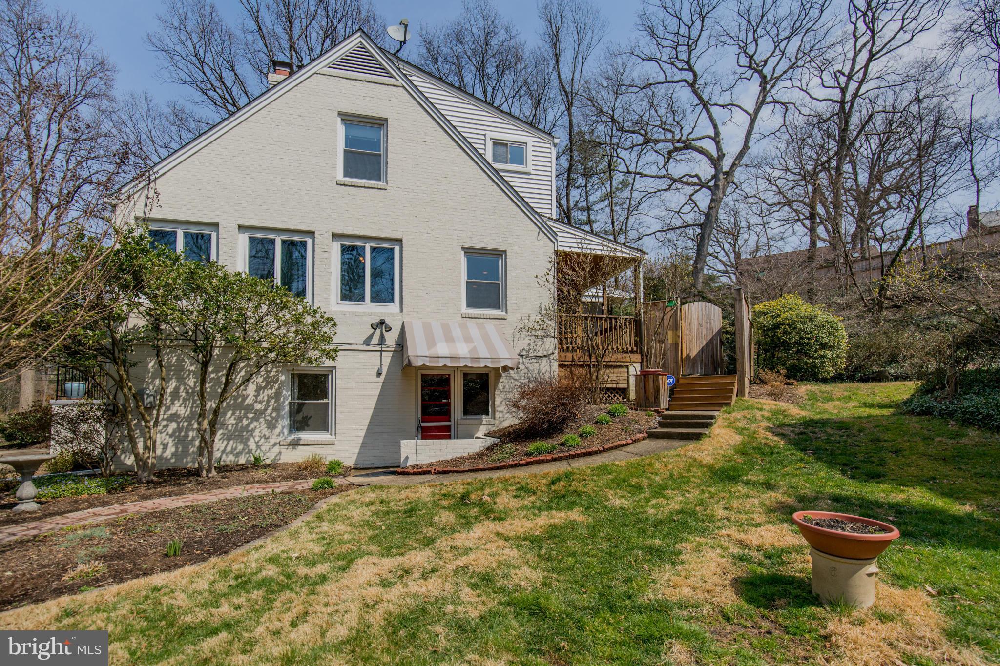 9601 Lorain Avenue Silver Spring, MD 20901 - Photo 3 of 30 a view of a house with backyard