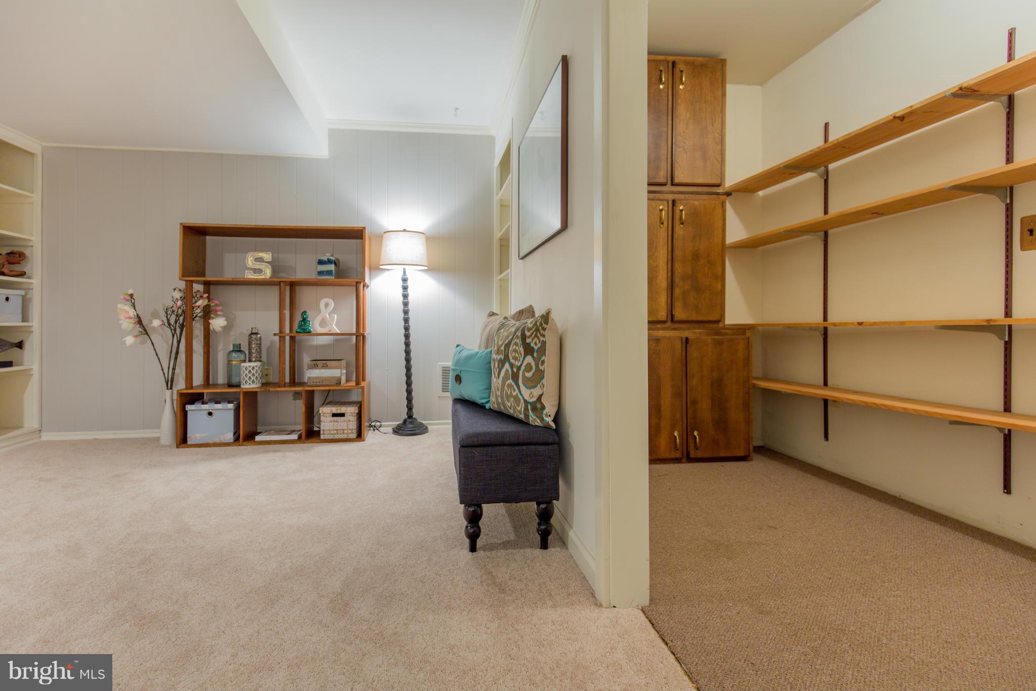 9601 Lorain Avenue Silver Spring, MD 20901 - Photo 24 of 30 a view of a livingroom with furniture and staircase