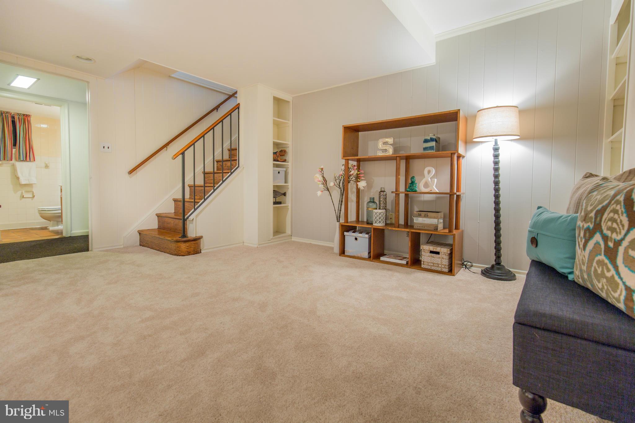 9601 Lorain Avenue Silver Spring, MD 20901 - Photo 25 of 30 a view of livingroom with furniture and stairs