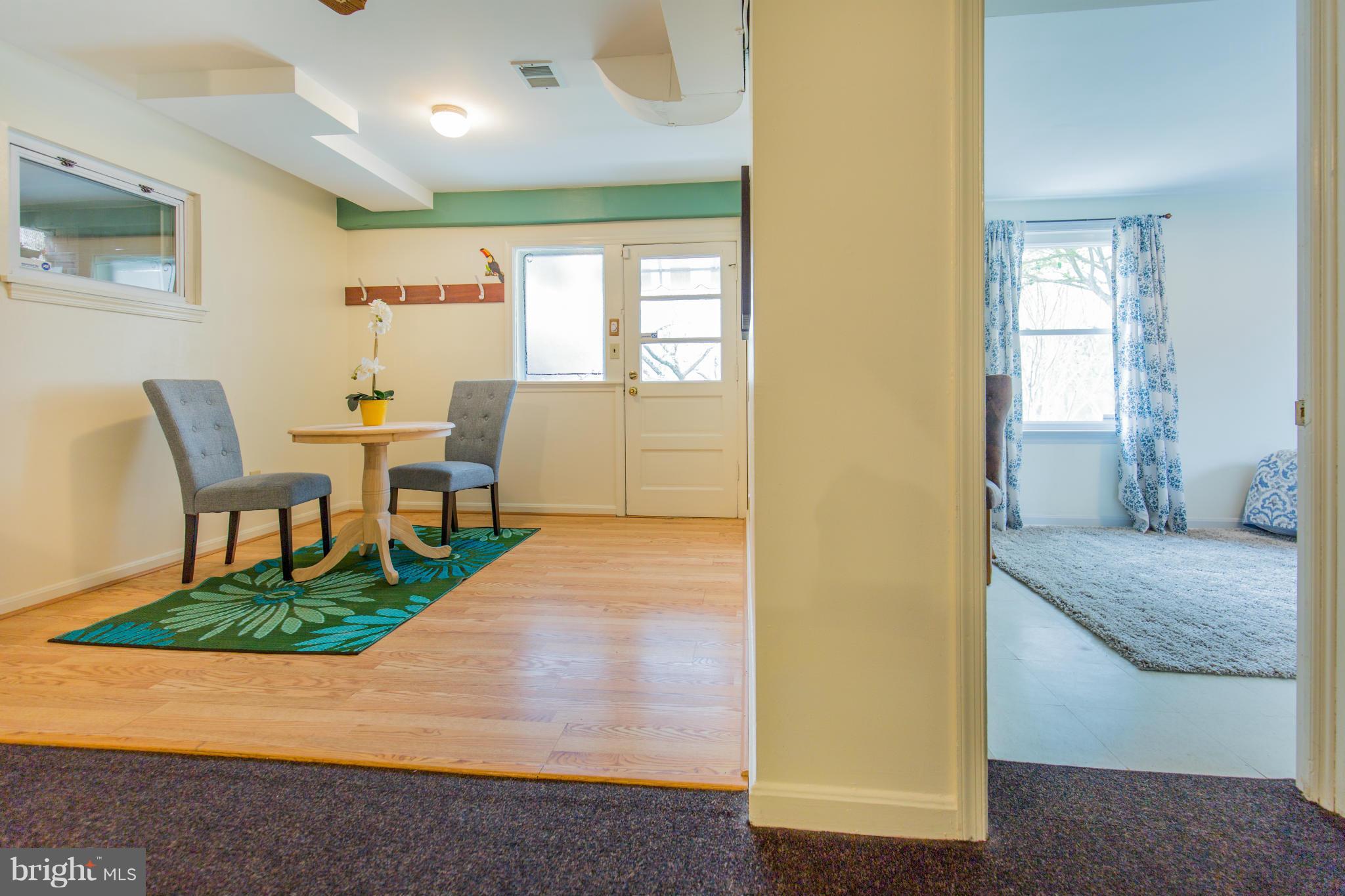 9601 Lorain Avenue Silver Spring, MD 20901 - Photo 26 of 30 a living room with furniture and a table