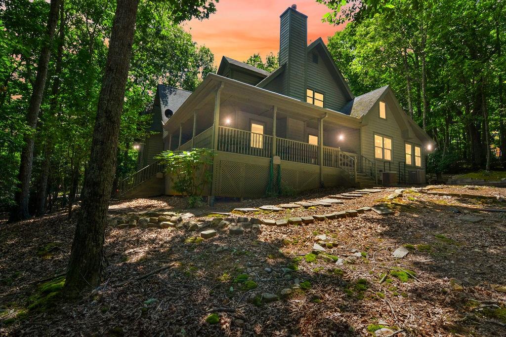 91 Mulligan Way Jasper, GA 30143 - Photo 1 of 1 a front view of a house with a yard