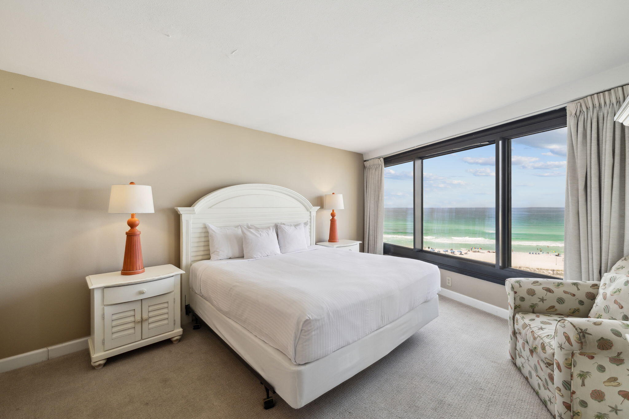 4072 Beachside 1, Unit 4072 Miramar Beach, FL 32550 - Photo 17 of 75 a bedroom with a bed and large window