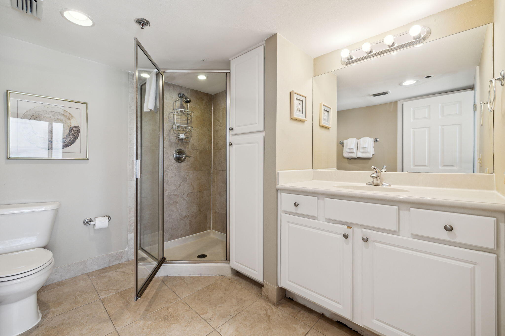4072 Beachside 1, Unit 4072 Miramar Beach, FL 32550 - Photo 20 of 75 a bathroom with a toilet sink and shower