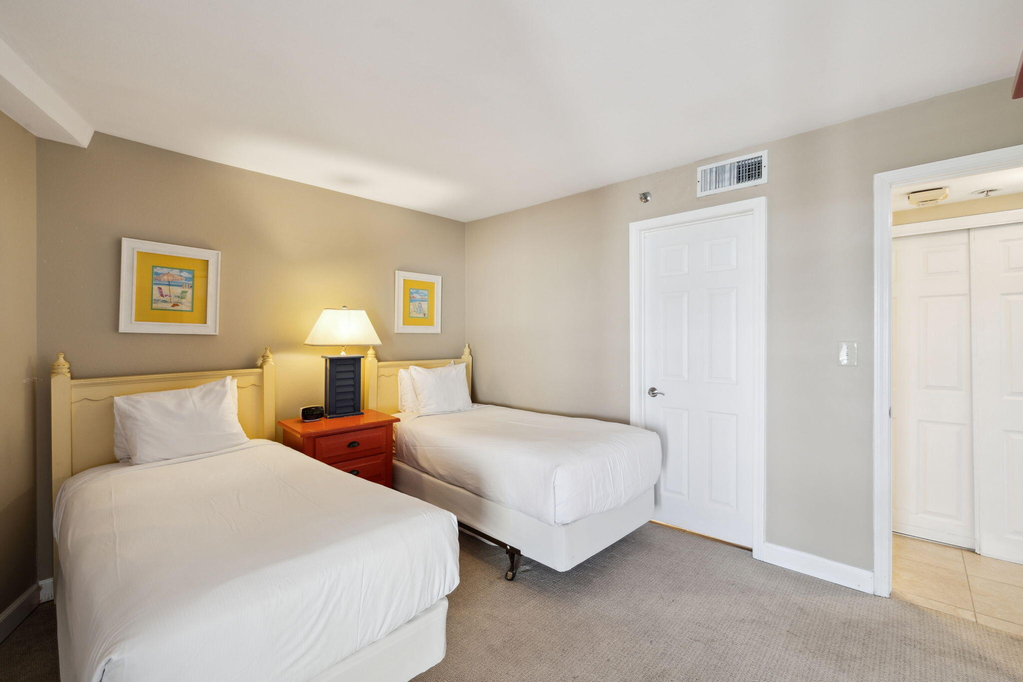 4072 Beachside 1, Unit 4072 Miramar Beach, FL 32550 - Photo 23 of 75 a bedroom with two beds and painting on the wall