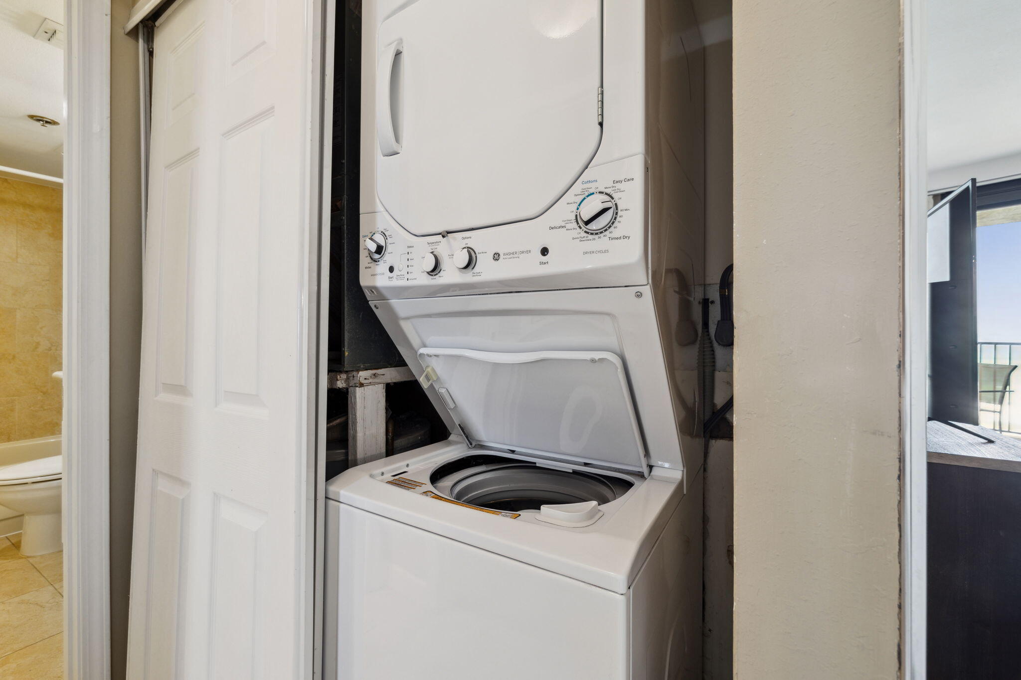 4072 Beachside 1, Unit 4072 Miramar Beach, FL 32550 - Photo 25 of 75 a utility room with dryer and washer