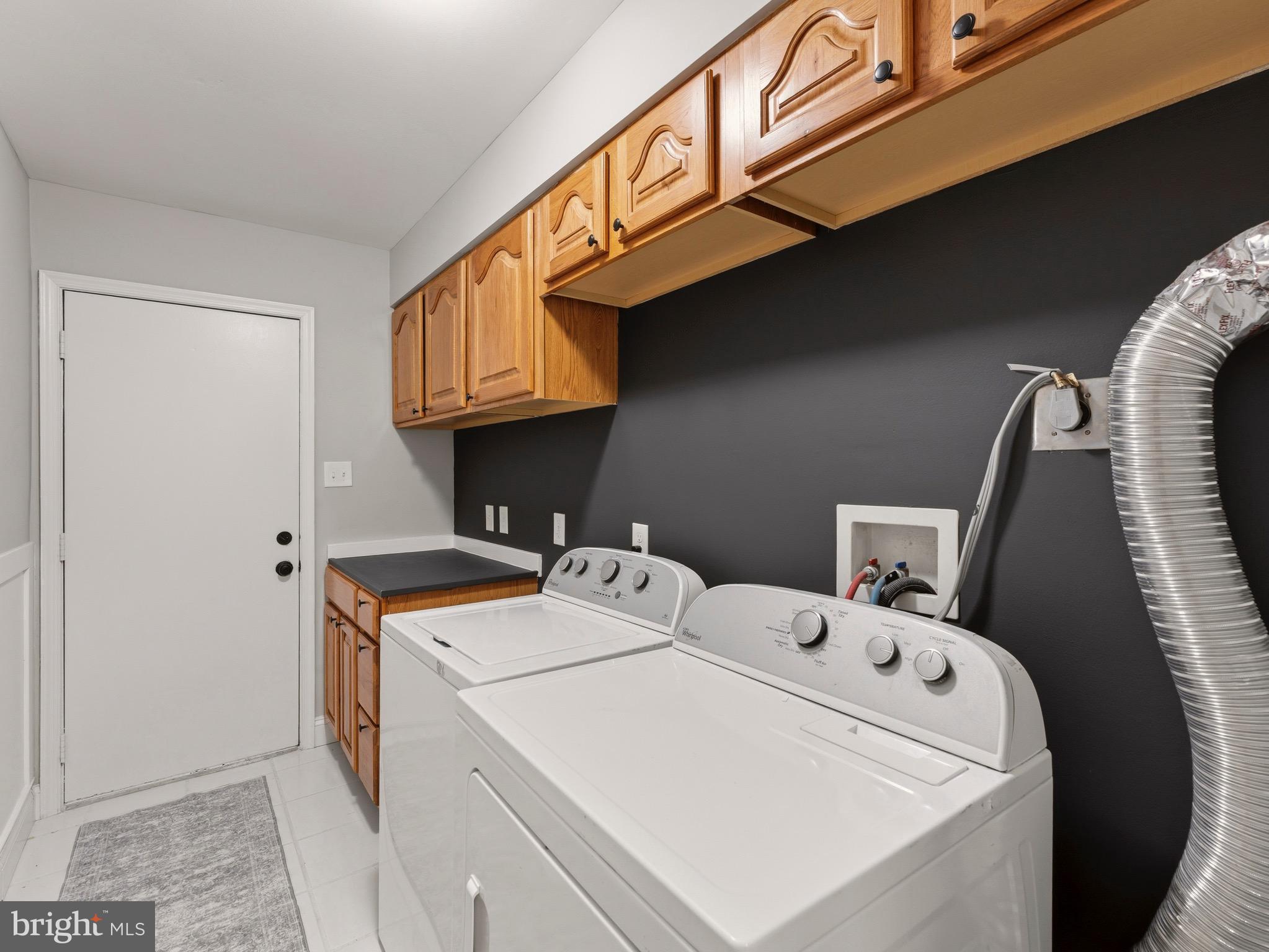 13744 Lockdale Road Silver Spring, MD 20906 - Photo 15 of 37 a utility room with dryer and washer