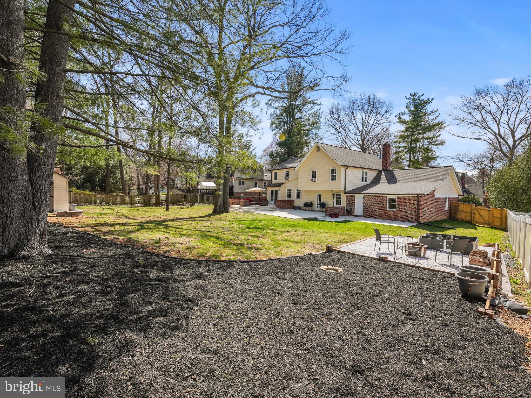 13744 Lockdale Road Silver Spring, MD 20906 - Photo 36 of 37 a view of swimming pool with lawn chairs and large trees