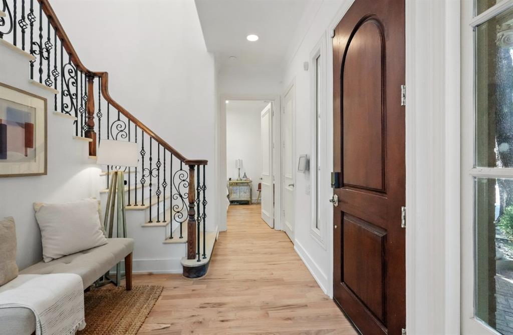 11911 Edgestone Road Dallas, TX 75230 - Photo 15 of 40 Entryway featuring light wood-type flooring, stairway, and recessed lighting