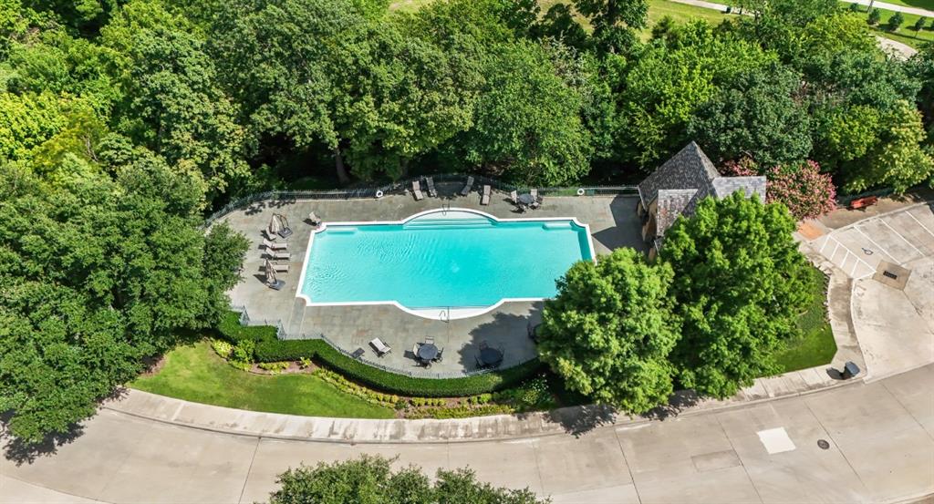 11911 Edgestone Road Dallas, TX 75230 - Photo 2 of 40 Drone / aerial view of a pool