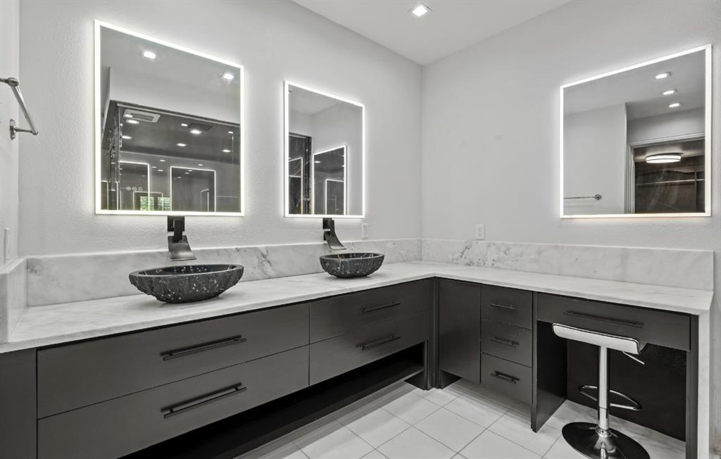 11911 Edgestone Road Dallas, TX 75230 - Photo 23 of 40 Bathroom featuring vanity, tile patterned flooring, a shower, and recessed lighting