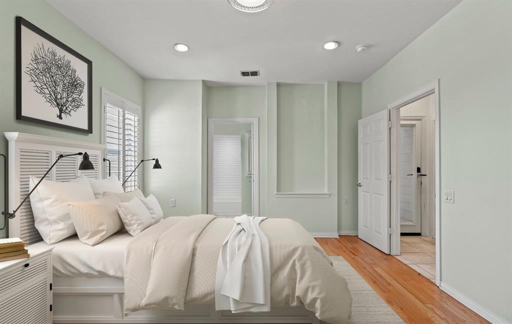 11911 Edgestone Road Dallas, TX 75230 - Photo 27 of 40 Bedroom featuring light wood-style floors and recessed lighting