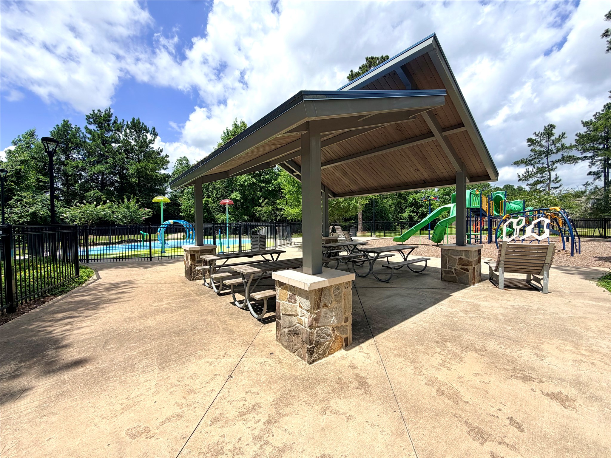 532 Flower Reed Court Magnolia, TX 77354 - Photo 37 of 43 The covered pavilion is close to the splash pad and playground and is the place to have a party or hang with with friends and neighbors!