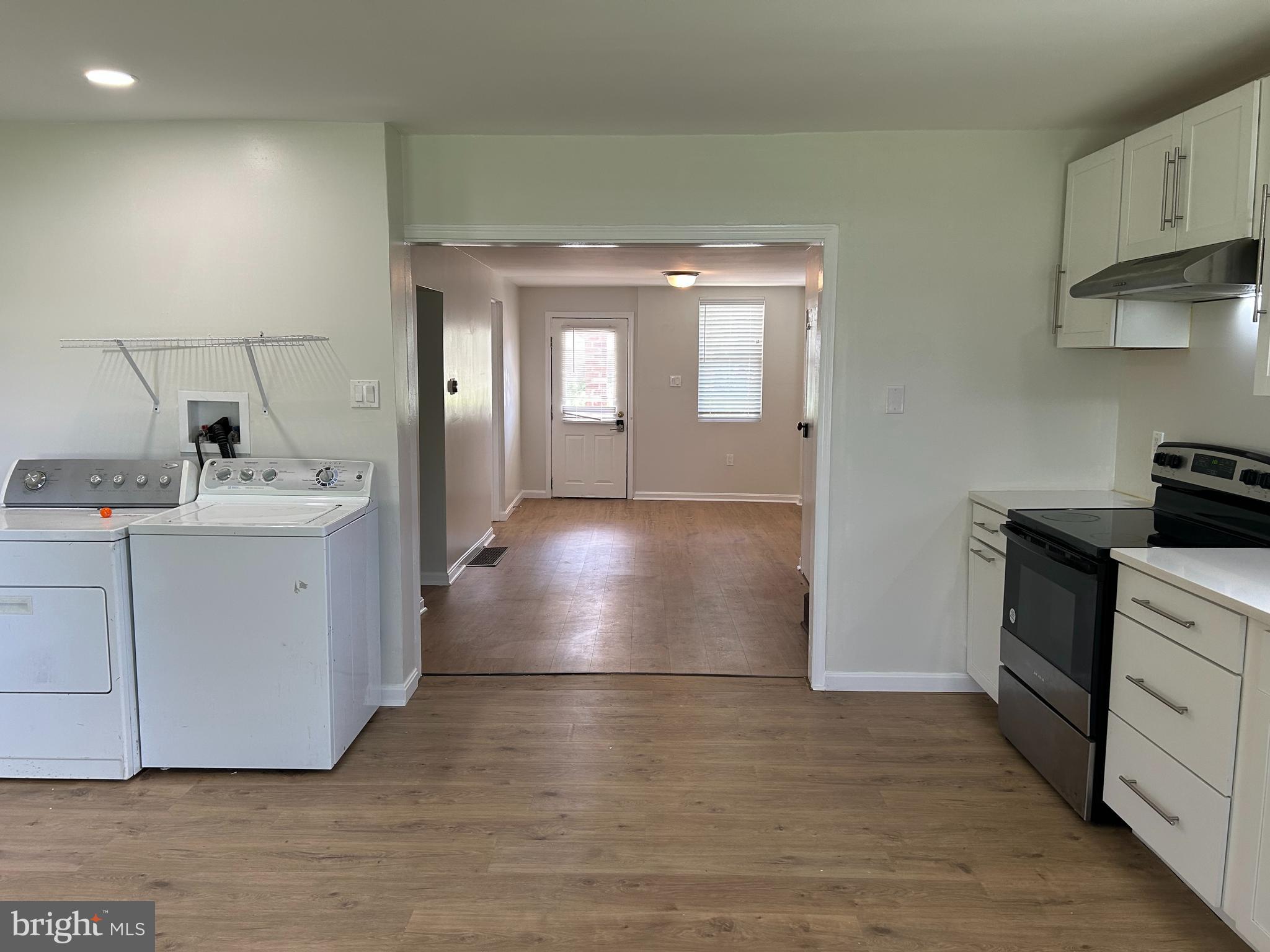1299 Porters Road Spring Grove, PA 17362 - Photo 6 of 21 a kitchen with a sink and wooden floor
