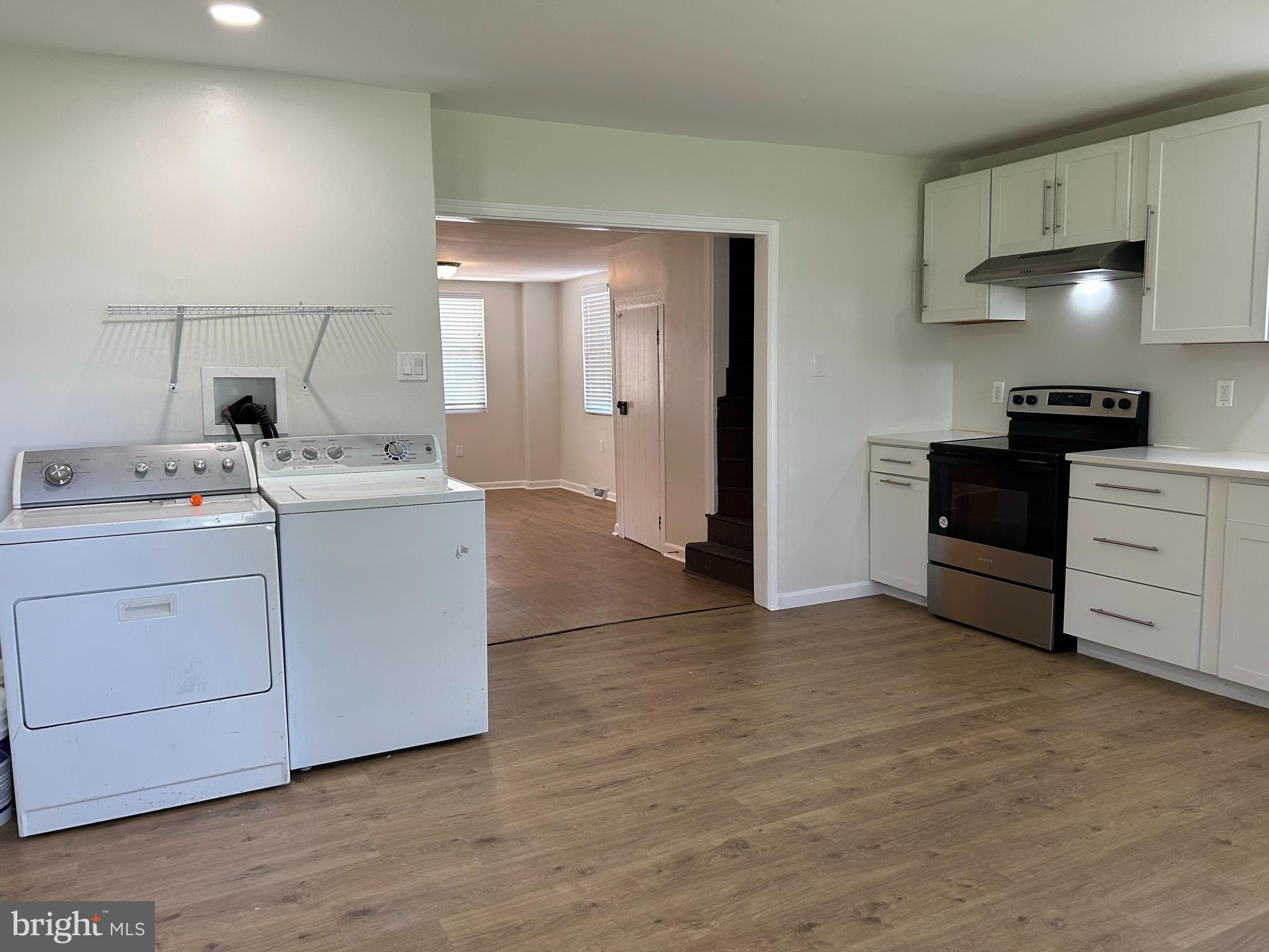 1299 Porters Road Spring Grove, PA 17362 - Photo 8 of 21 a utility room with cabinets washer and dryer