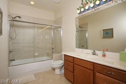 28605 San Lucas Lane, Unit 102 Bonita Springs, FL 34135 - Photo 13 of 20 a bathroom with a sink a toilet and shower
