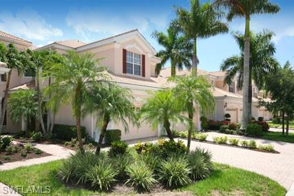28605 San Lucas Lane, Unit 102 Bonita Springs, FL 34135 - Photo 20 of 20 a front view of house with yard and green space