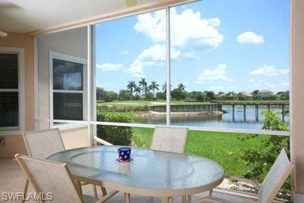 28605 San Lucas Lane, Unit 102 Bonita Springs, FL 34135 - Photo 2 of 20 a view of a patio with a table chairs and a table