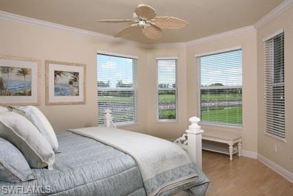 28605 San Lucas Lane, Unit 102 Bonita Springs, FL 34135 - Photo 10 of 20 a bedroom with a bed and a window