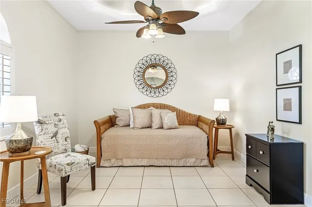 a bedroom with a bed and a table