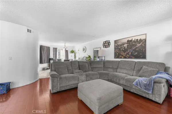 a living room with furniture and a couch