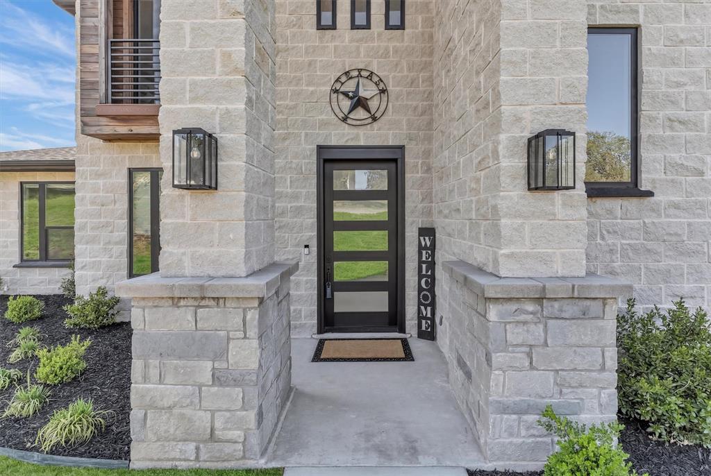 175 Bittersweet Trail Weatherford, TX 76088 - Photo 12 of 40 a front view of a house with entryway