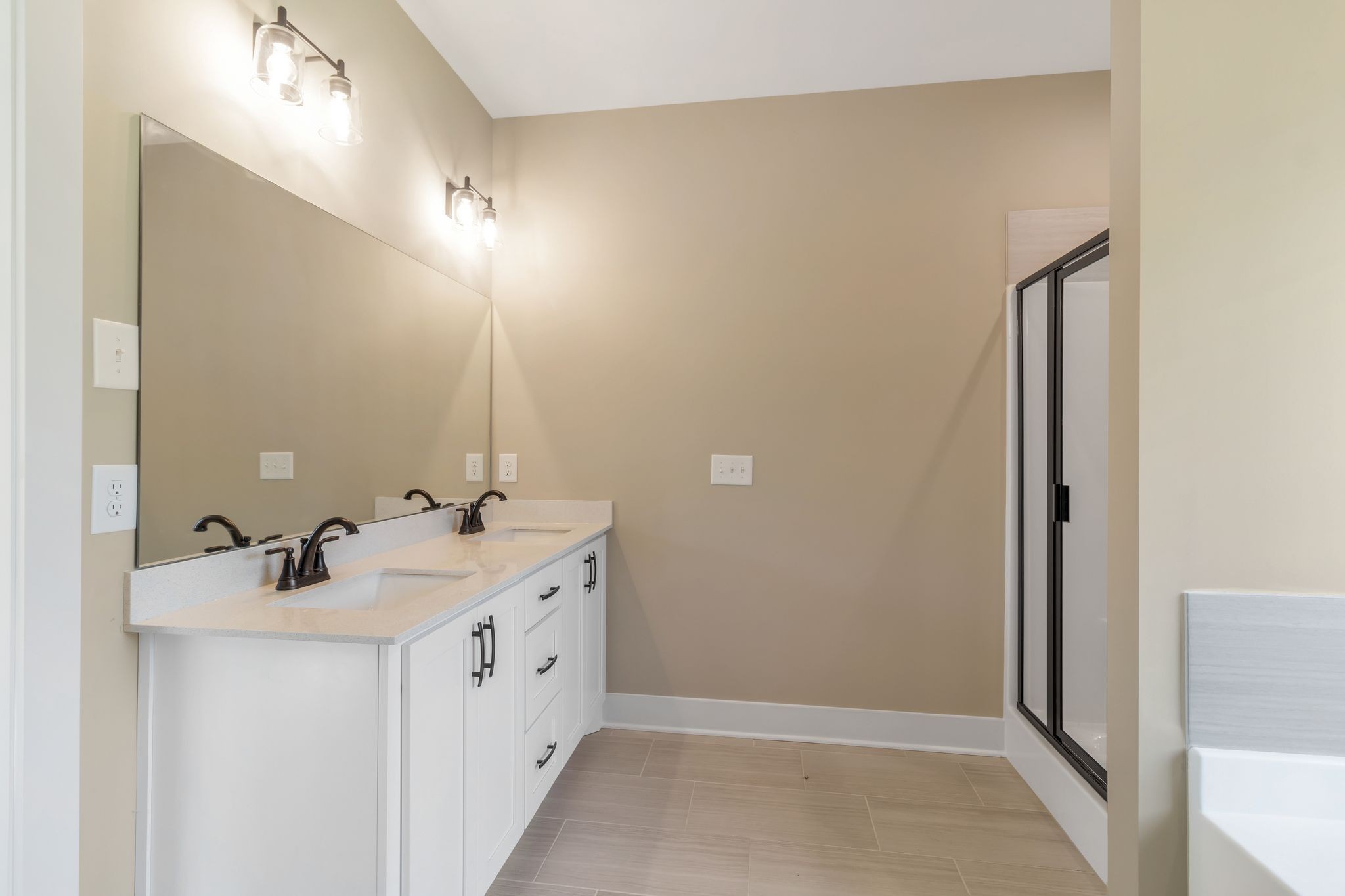 1175 Rimrock Road Smyrna, TN 37167 - Photo 22 of 35 a spacious bathroom with a double vanity sink and mirror