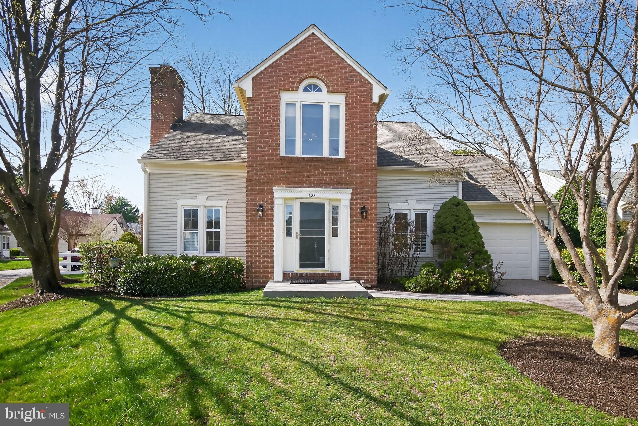 825 Dunbrooke Court Frederick, MD 21701 - Photo 1 of 31 a front view of a house with garden
