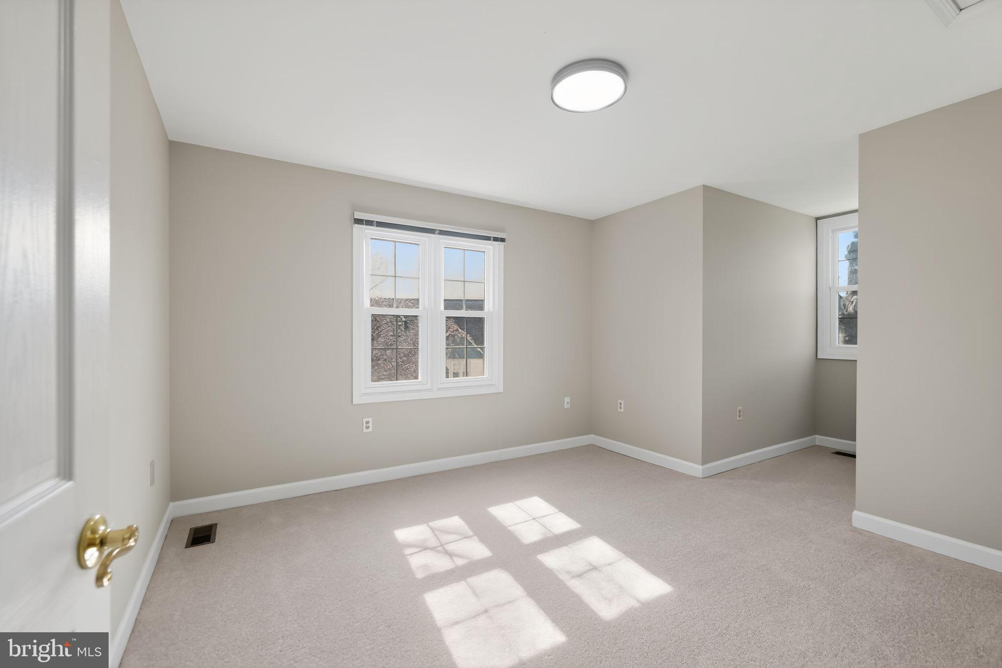 825 Dunbrooke Court Frederick, MD 21701 - Photo 24 of 31 an empty room with windows