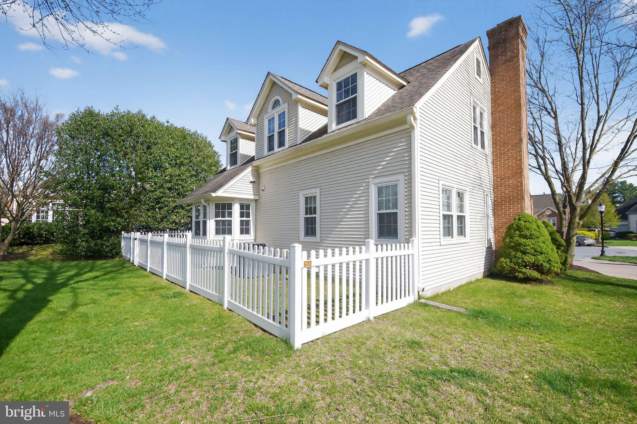 825 Dunbrooke Court Frederick, MD 21701 - Photo 5 of 31 a view of a house with a yard and deck