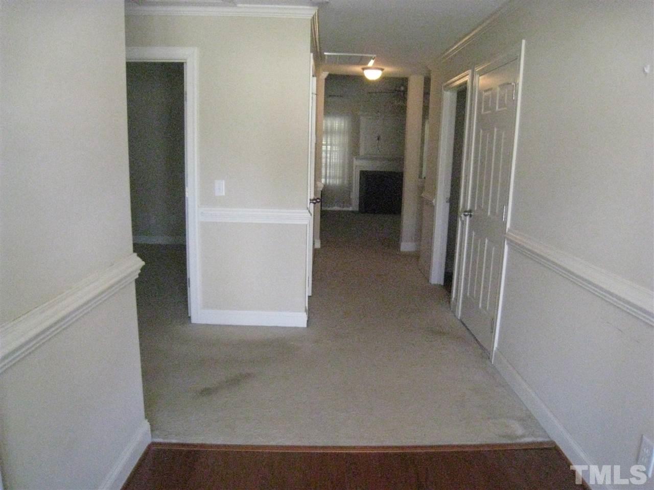 60 Brax Carr Way Angier, NC 27501 - Photo 4 of 14 a view of a hallway with closet and a bathroom