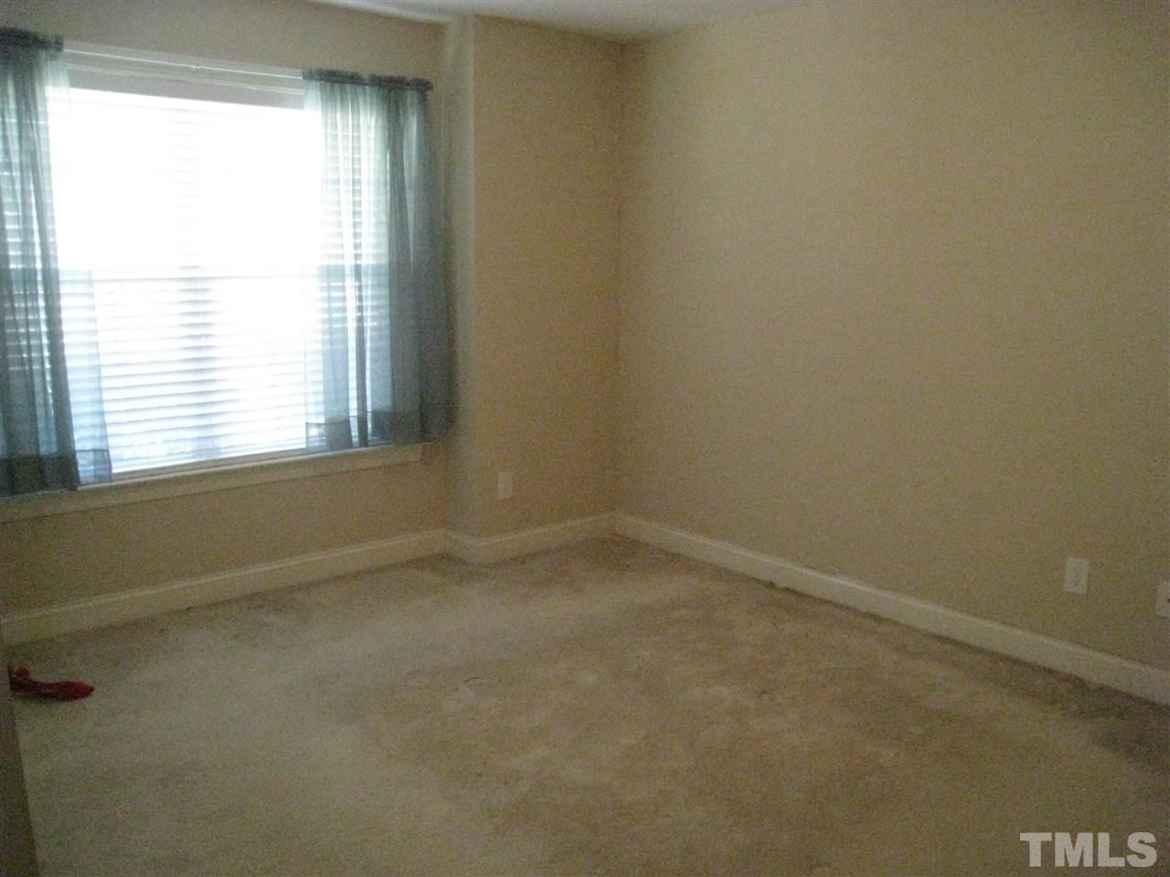 60 Brax Carr Way Angier, NC 27501 - Photo 10 of 14 an empty room with a window
