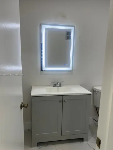a view of a bathroom from a bathroom