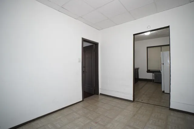 an empty room with a bathroom