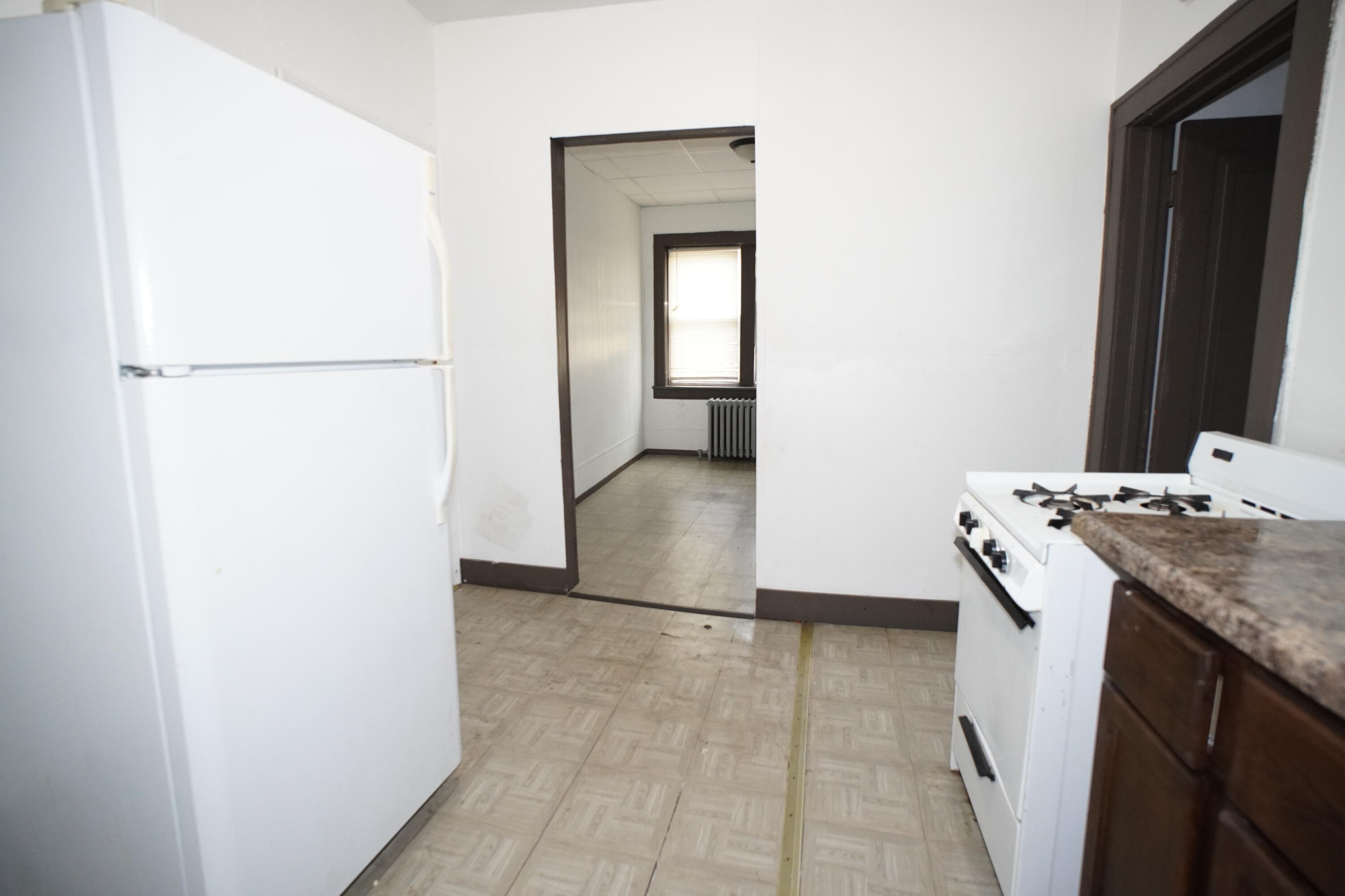 130 East 13th Avenue, Unit 8 Gary, IN 46407 - Photo 15 of 17 a bathroom with a sink and a mirror