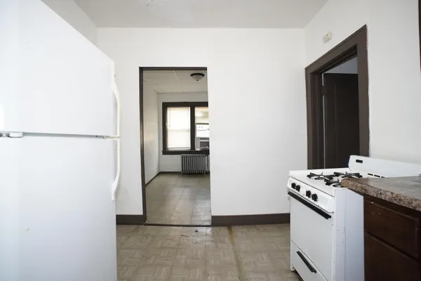 a view of kitchen and utility room