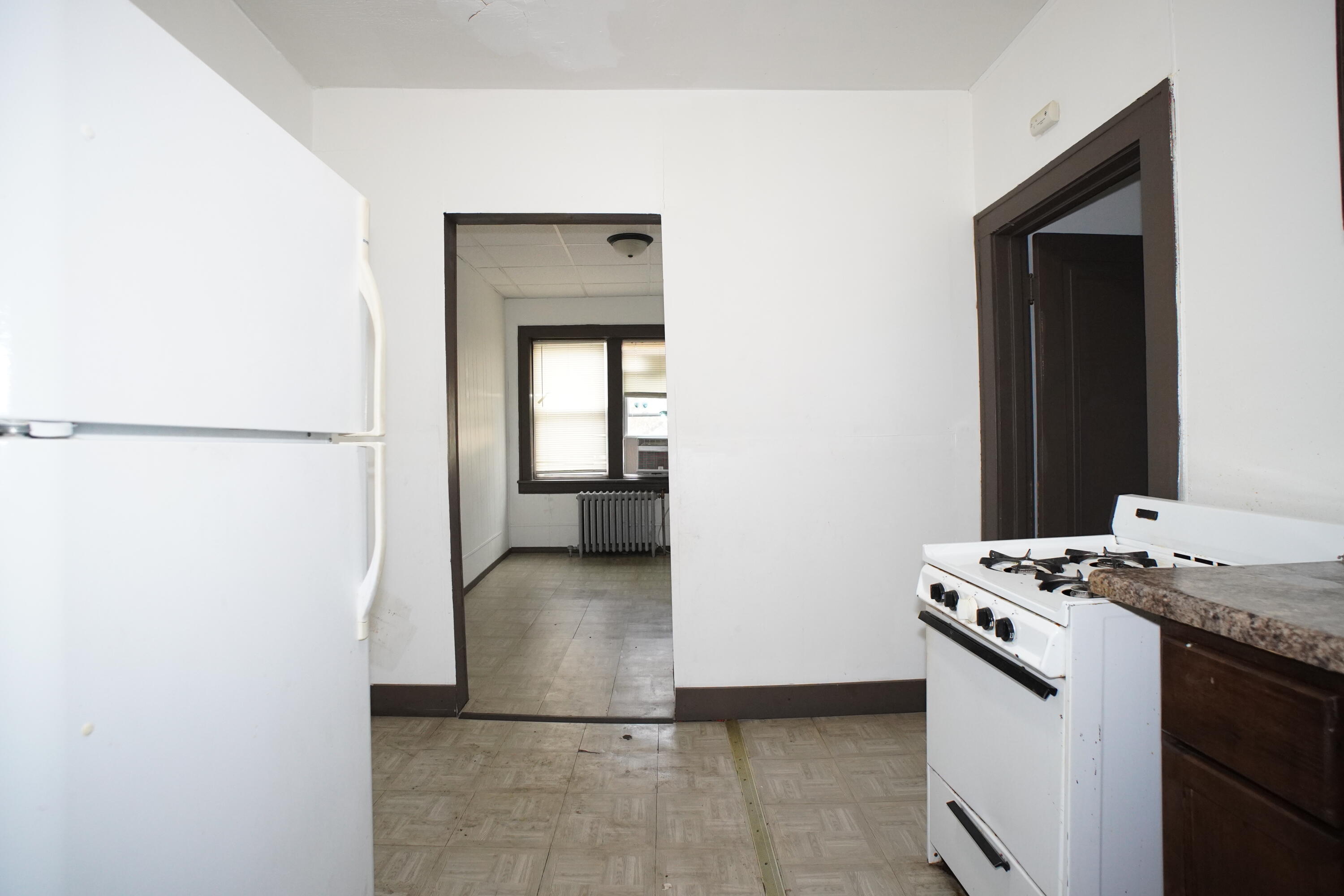 130 East 13th Avenue, Unit 8 Gary, IN 46407 - Photo 16 of 17 a view of kitchen and utility room