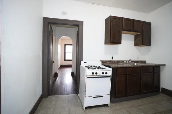 a view of a hallway with washer and dryer