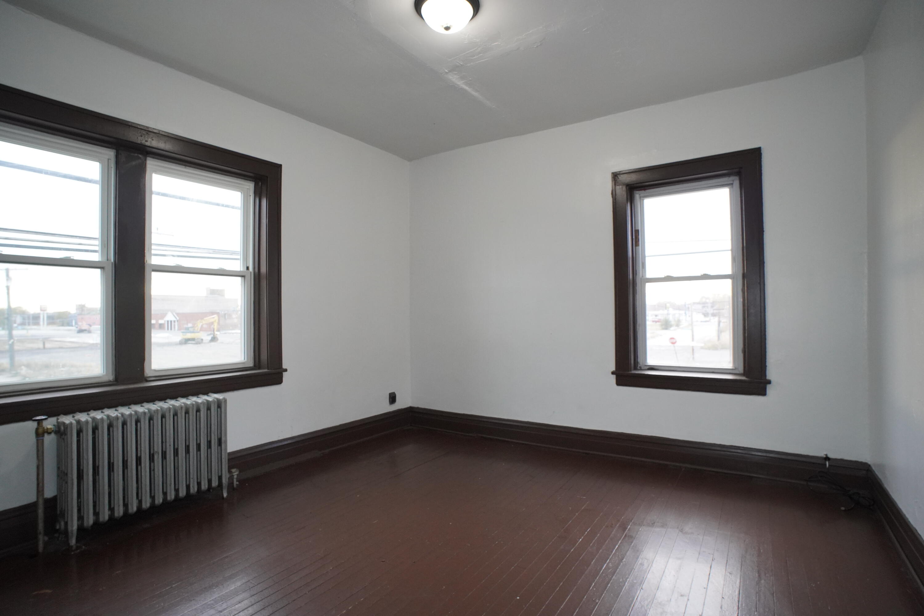 130 East 13th Avenue, Unit 8 Gary, IN 46407 - Photo 3 of 17 an empty room with a window