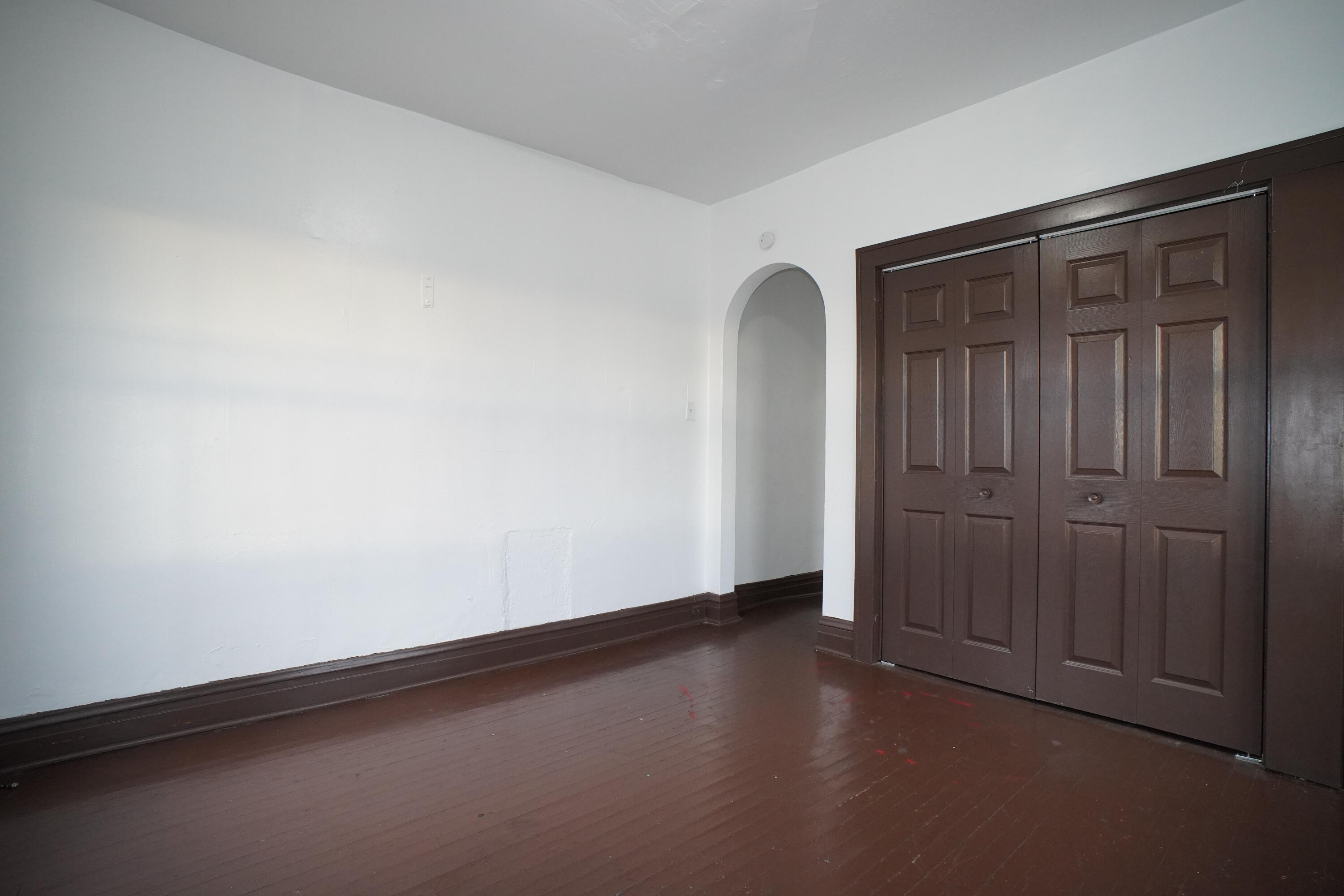 130 East 13th Avenue, Unit 8 Gary, IN 46407 - Photo 8 of 17 an empty room with closet area