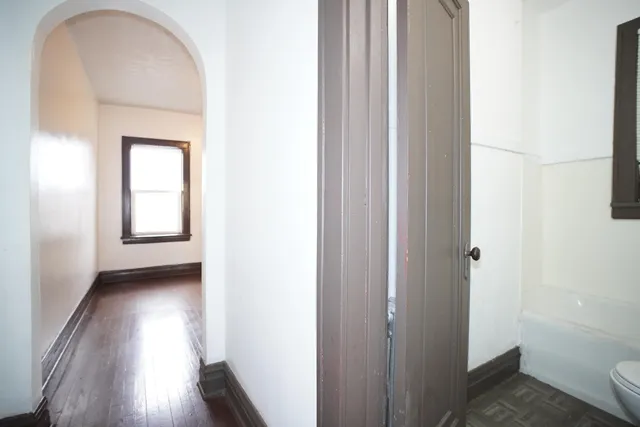 a view of a room that has a window in it